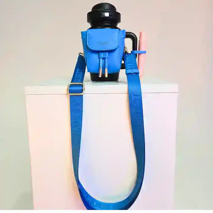 Coldest mini backpack with squeeze holder, key hanger, and mint box, featuring a compact design and pastel mint color.