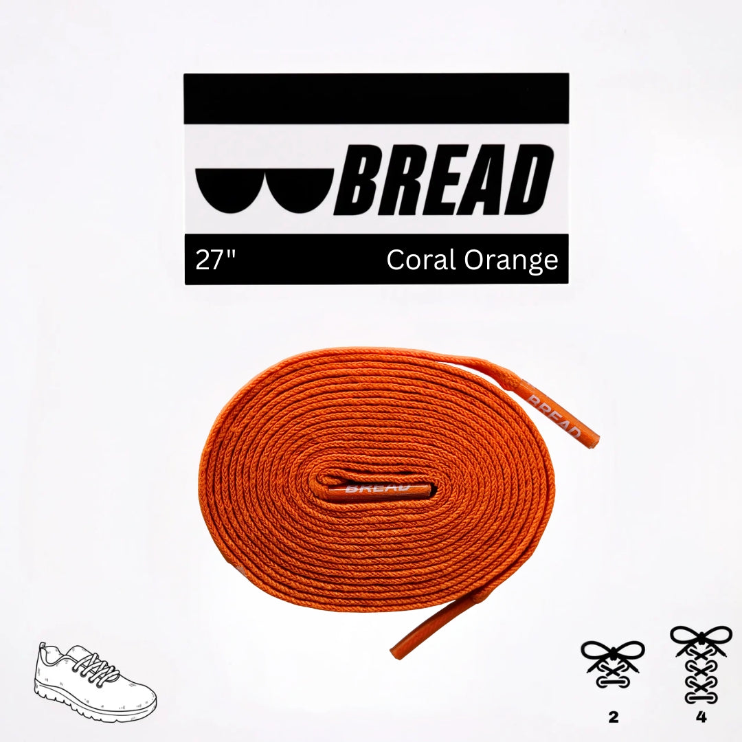 Coral orange elastic shoelace by Bread, flexible and durable for sneakers or casual shoes, shown in close-up view.