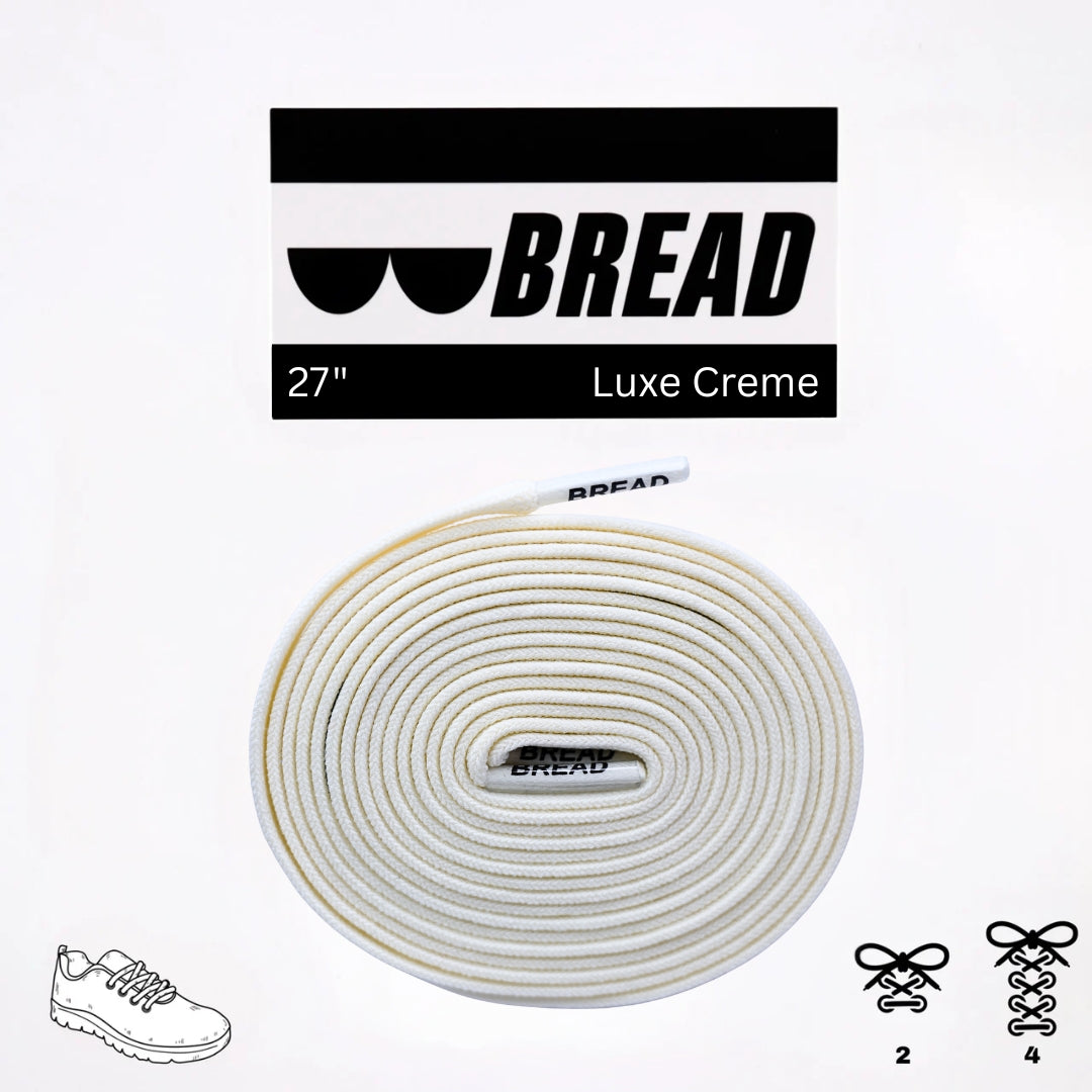 Elastic shoelace labeled Luxe Creme by Bread, shown in a close-up image highlighting its soft, stretchy texture and color.