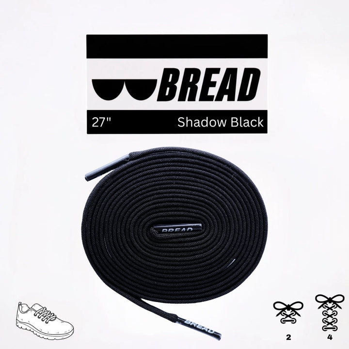 Black elastic shoelace by Bread, styled as classic black shoe laces, with a flexible, stretchy design for comfortable fit.