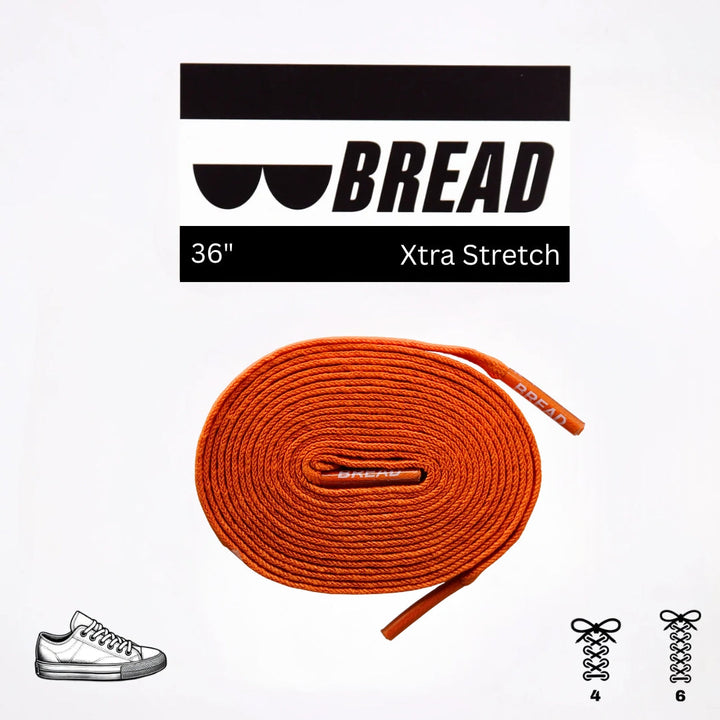 Bright coral orange elastic shoelace by Bread, flexible and stretchy for comfortable, secure fit on athletic or casual shoes.