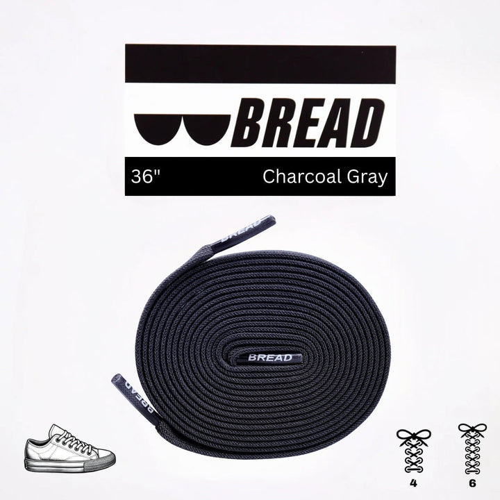 Charcoal grey elastic shoelace by Bread, flexible and stretchy for comfortable, secure fit in casual or athletic shoes.