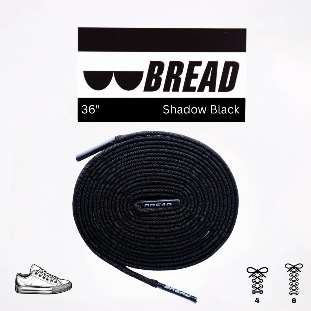 Black elastic shoelace by Bread, showcasing a flexible, stretchable fit perfect for casual sneakers or athletic footwear.