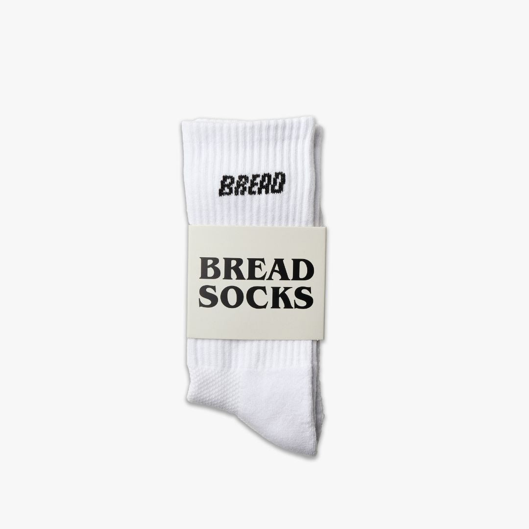 Pair of Bread Crew Socks featuring colorful bread graphic design on soft, comfortable fabric, perfect for casual wear.