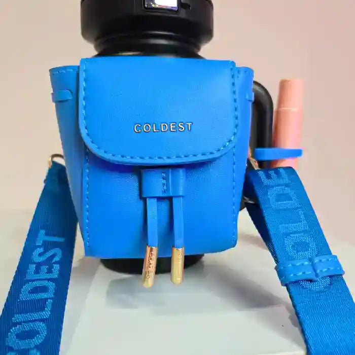 Coldest mint-colored mini backpack with squeeze holder and key hanger, shown with compact mint box for accessories.