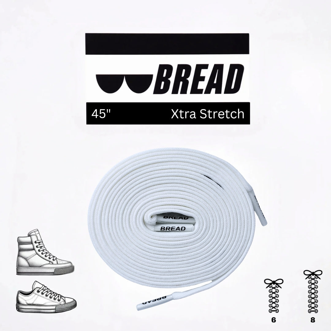 Elastic shoelace in Cloud White by Bread, showing a close-up of the flexible, durable laces threaded through sneaker eyelets.