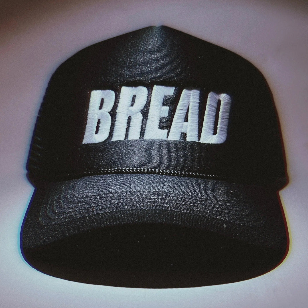 Bread brand bread-shaped hat with realistic bread loaf design and soft fabric texture, perfect for costume or novelty wear.