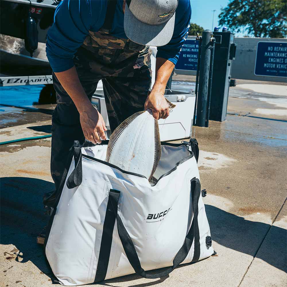 Buffalo Gear 58QT fish cooler bag with flat bottom for keeping catches cold during fishing trips.