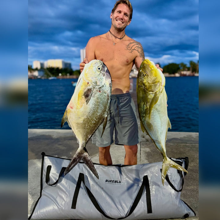 Buffalo Gear 60x24-inch fish cooler bag with YKK zipper, showing durable insulated exterior and sturdy zipper closure.