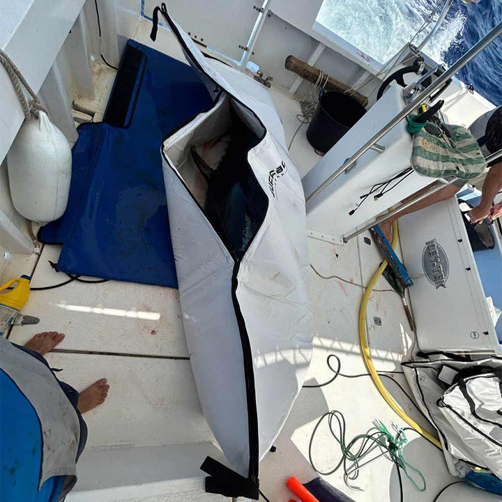 Buffalo Gear 80x40-inch fish cooler bag with YKK zipper, insulated for keeping fish fresh during outdoor fishing trips.