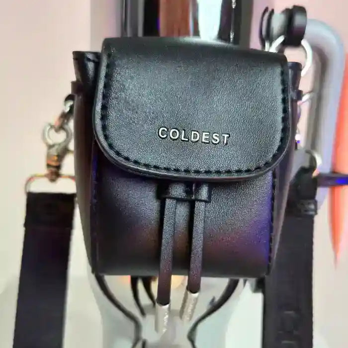 Coldest mini backpack with squeeze holder, key hanger, and mint box, featuring a compact, stylish design for everyday use.