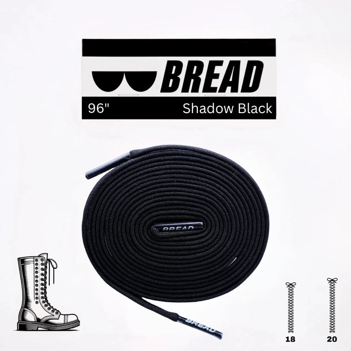 Black elastic shoelace by Bread, flexible and durable, shown in the Shadow Black color on a classic shoe.