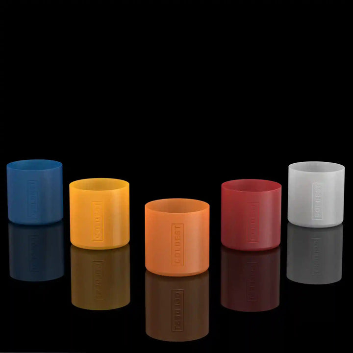 Set of five Coldest Boots accessory glow-in-the-dark boots in various colors, designed for cold weather and outdoor activities.