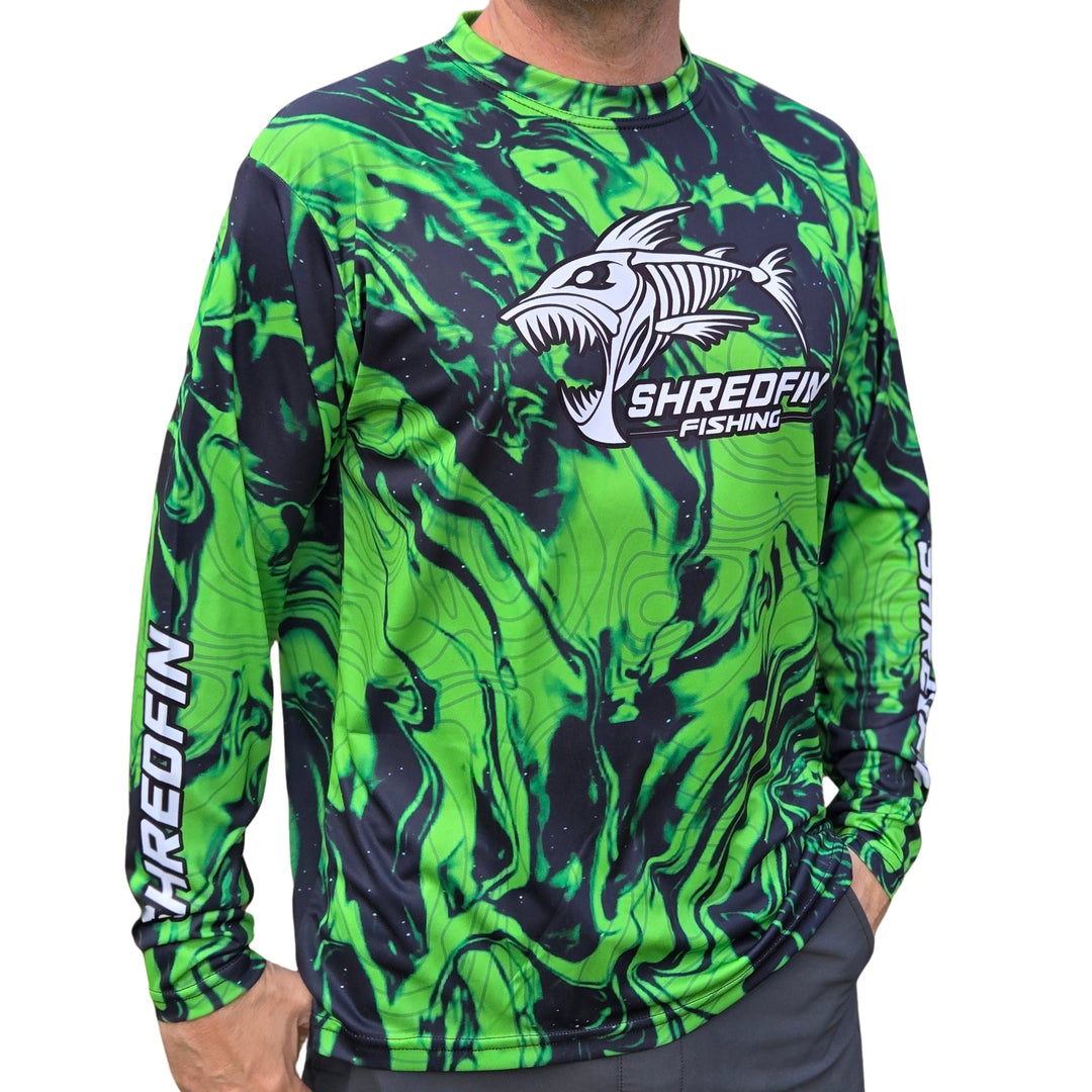 ShredFin StormSurge Performance Shirt in Toxic Lime Swirl, featuring vibrant lime and swirl design, shown on a neutral background.