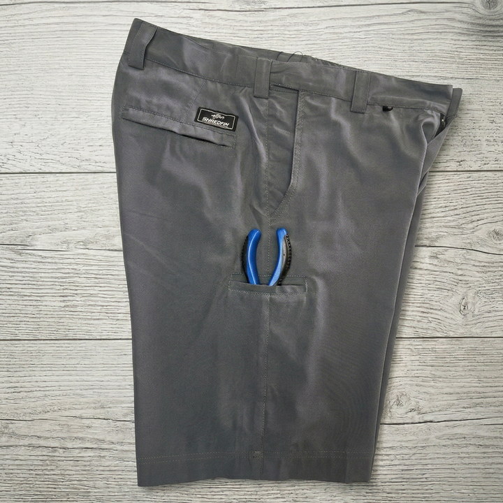 ShredFin HookSet shorts with plier pocket featuring durable fabric and practical design for outdoor activities.
