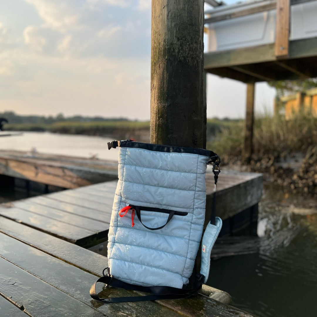 Monti Coolers Mayfly 14L cooler with sturdy handle and compact design, ideal for outdoor and travel use.