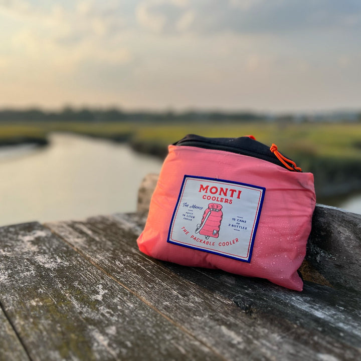 Monti Coolers Mayfly 14L cooler with sturdy handle and compact design, suitable for outdoor and camping use.