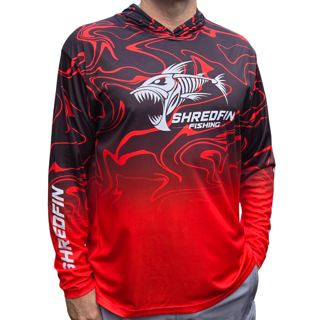 ShredFin Contourz RipTide Hooded Performance Shirt in Red Sea Fade, shown in outdoor lake setting after swimming with a friend