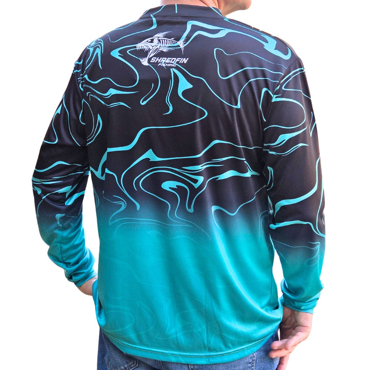 ShredFin RipTide Performance Shirt in seafoam fade, worn by a person and a buddy after lake time, casual outdoor clothing.