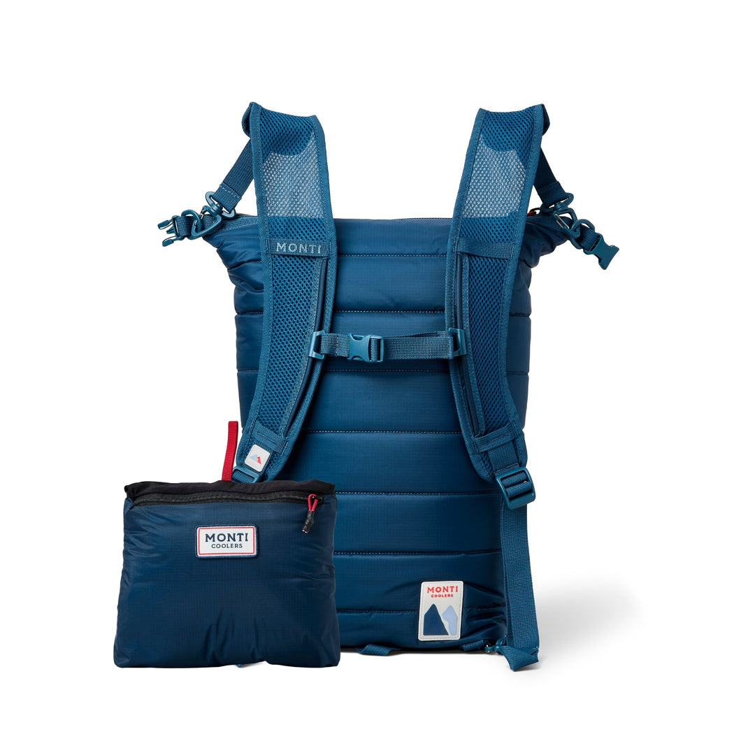 Monti Coolers Mayfly 14L cooler in navy with sturdy handle and compact design for outdoor cooling needs.