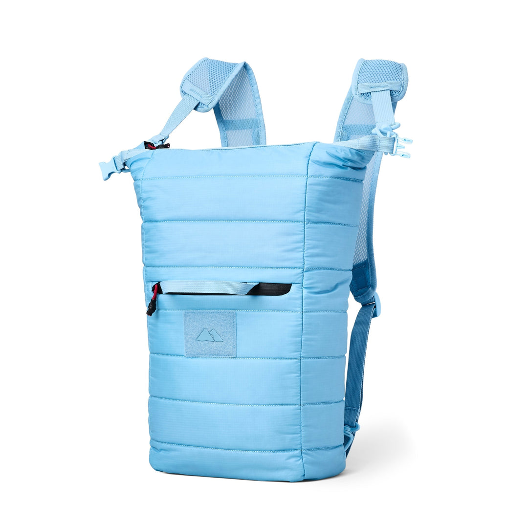 Sky blue Monti Mayfly 14L cooler with side handles, compact and portable for outdoor adventures.