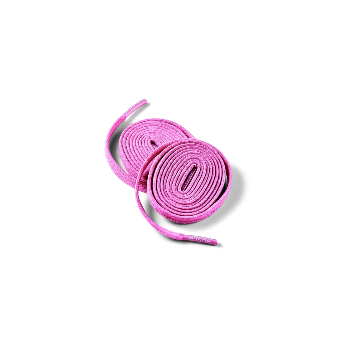 Pink elastic shoelace by Bread, stretchy and colorful accessory for sneakers or casual shoes.