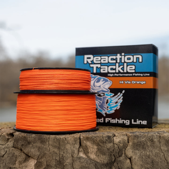Reaction Tackle braided fishing line in Hi-Vis Orange, showing the durable, high-visibility fishing line in a close-up shot.
