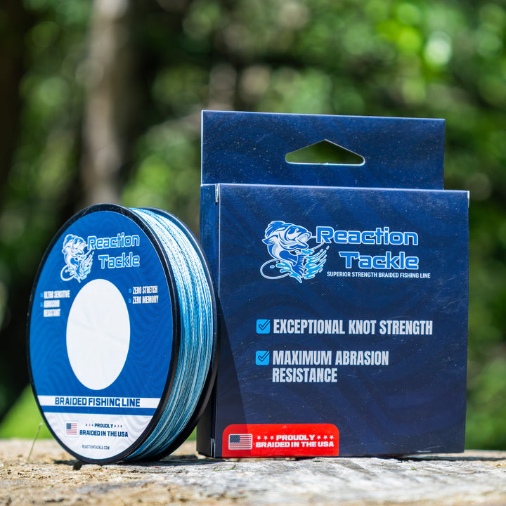 Reaction Tackle braided fishing line in USA packaging, showing the durable, high-strength braided fishing line for freshwater and saltwater use.