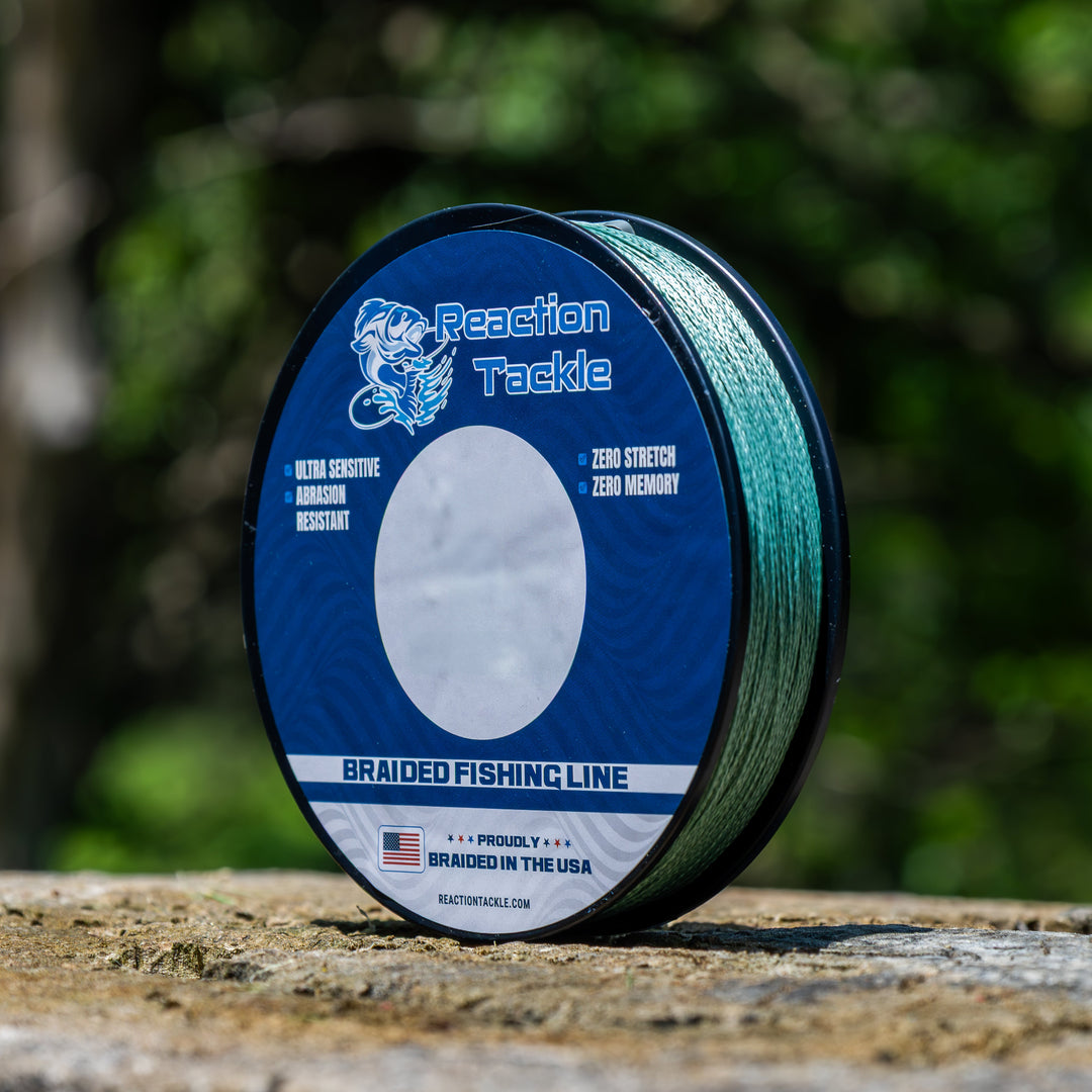 Reaction Tackle braided fishing line in USA, close-up of the durable, tightly woven braided fishing line with Reaction Tackle branding.