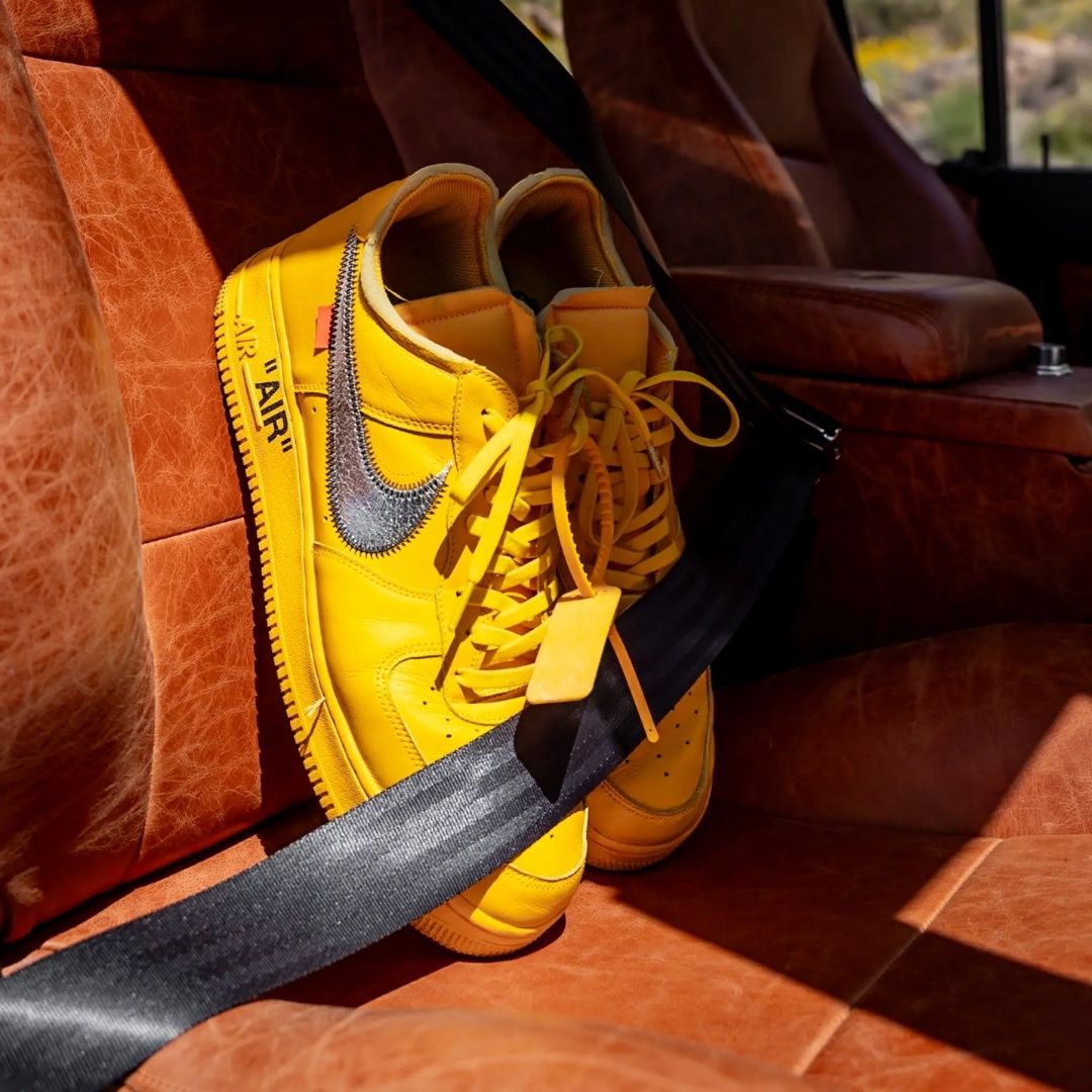Yellow elastic shoelace by Bread, designed for easy tightening and secure fit on casual shoes.