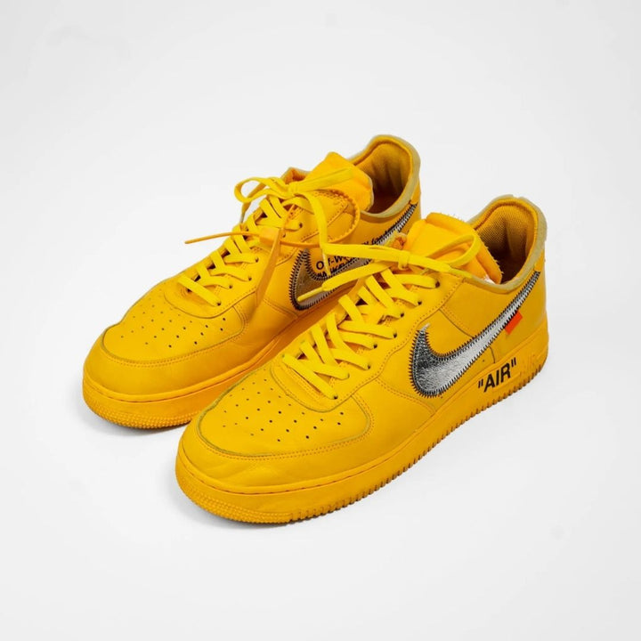 Yellow elastic shoelaces by Bread, designed for easy slip-on and secure fit on sneakers or casual shoes.