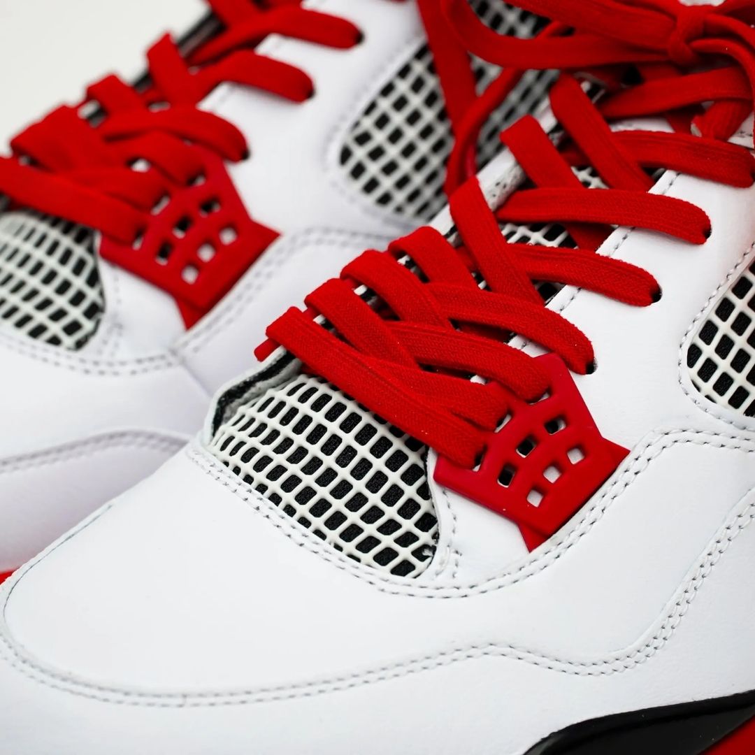 Red elastic shoelace from Bread, showcasing a close-up of the flexible, durable laces designed for easy slip-on and secure fit.