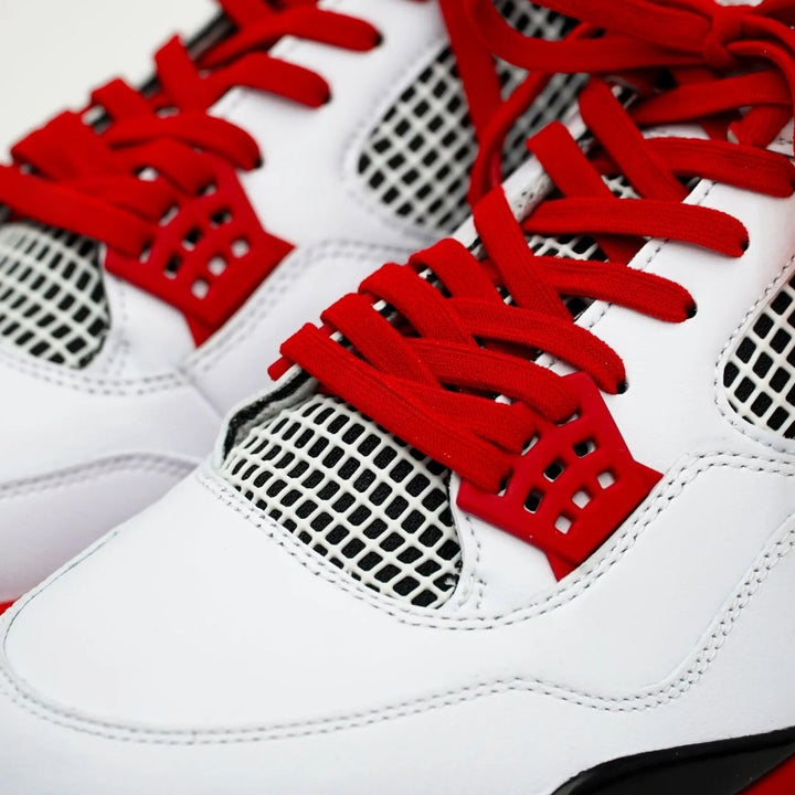 Red elastic shoelace from Bread, showcasing a close-up of the flexible, durable laces designed for easy slip-on and secure fit.