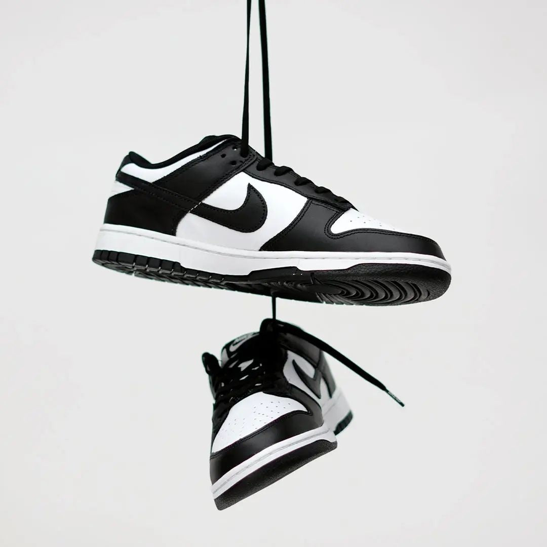 Black elastic shoelace by Bread, showing a close-up of the flexible, durable laces with a snug fit and sleek shadow black color.