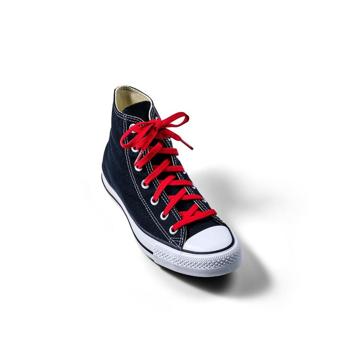 Red elastic shoelace by Bread, showcasing flexible and durable design with metal aglets for easy lacing and secure fit.