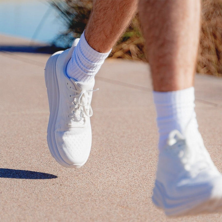 Elastic shoelace in cloud white by Bread, showing the flexible, durable design with a snug fit for various footwear styles.