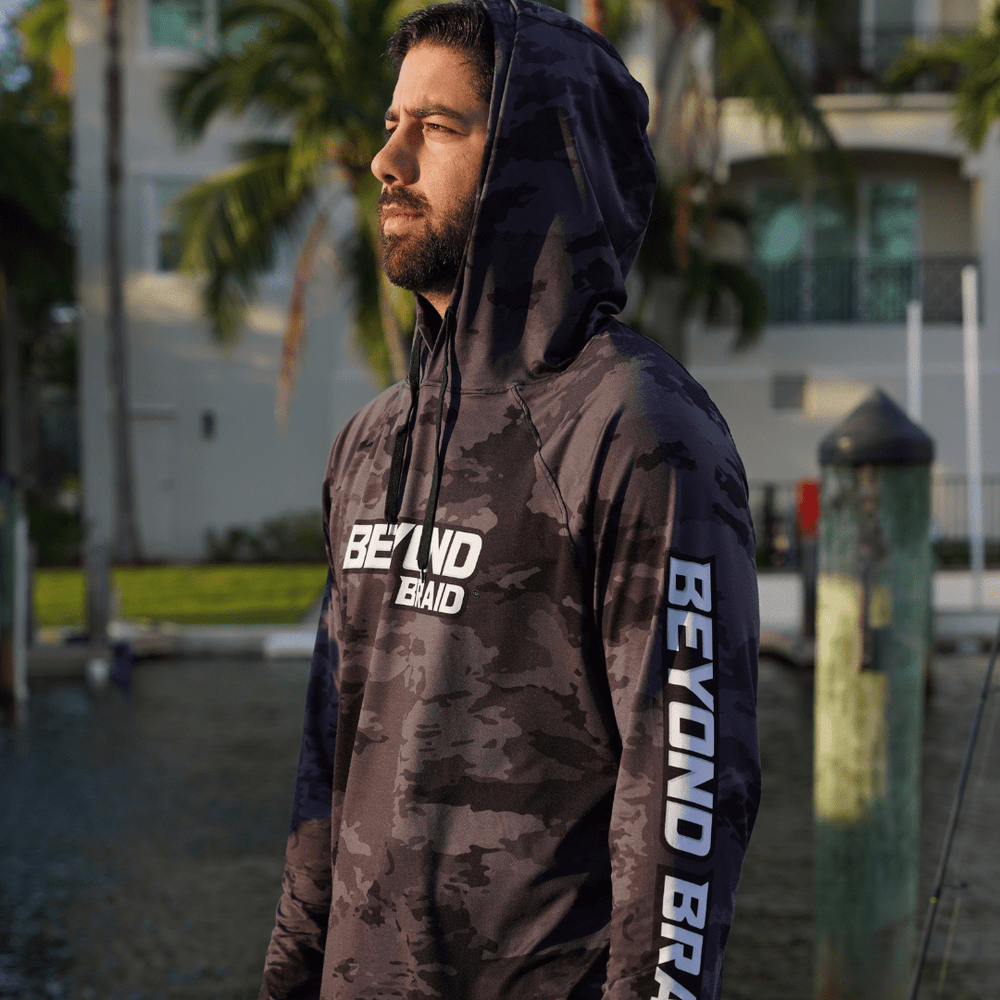 Beyond Braid long sleeve hooded performance fishing shirt, lightweight and moisture-wicking with a sun protection hood.