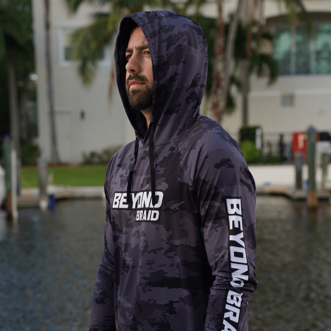 Beyond Braid long sleeve hooded performance fishing shirt with lightweight fabric and UPF sun protection, ideal for outdoor fishing.