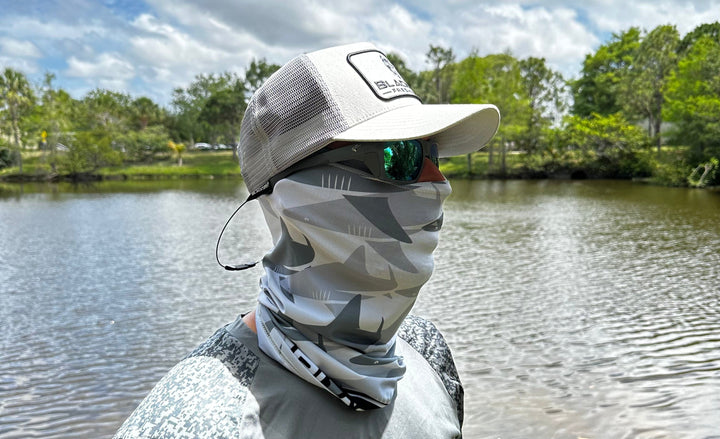 Gray BlacktipH Performance Face Shield worn as apparel and accessories, showcasing its breathable fabric and snug fit.