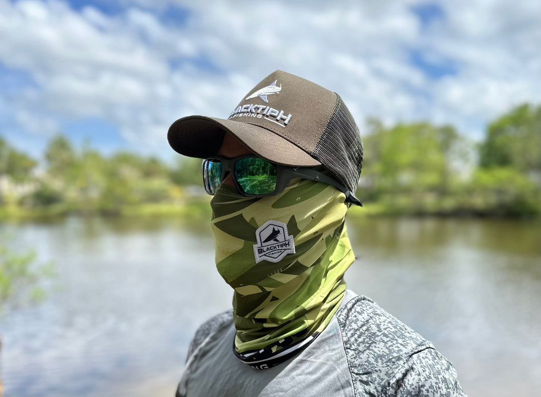 BlacktipH green performance face shield, lightweight apparel accessory with adjustable fit and breathable fabric for outdoor activities.