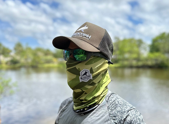 BlacktipH green performance face shield, lightweight apparel accessory with adjustable fit and breathable fabric for outdoor activities.