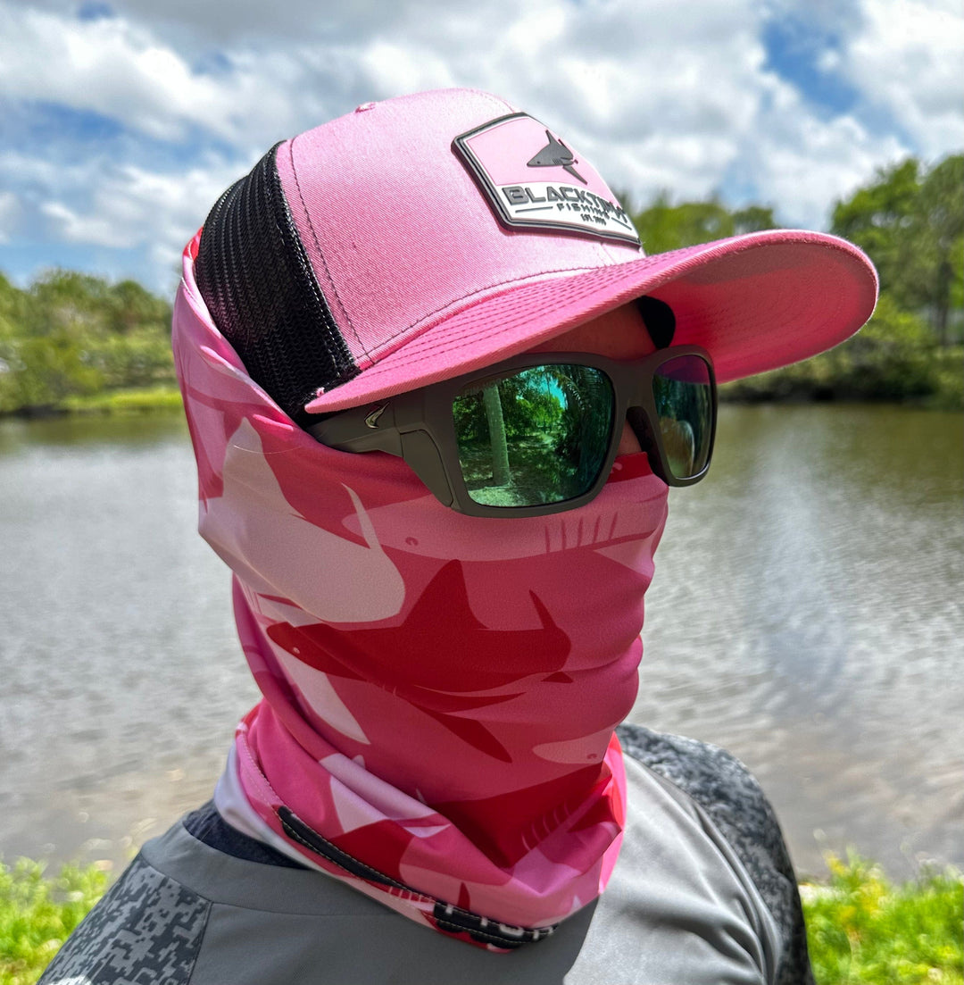 Pink performance face shield by BlacktipH, lightweight and breathable apparel accessory for outdoor sports and activities.