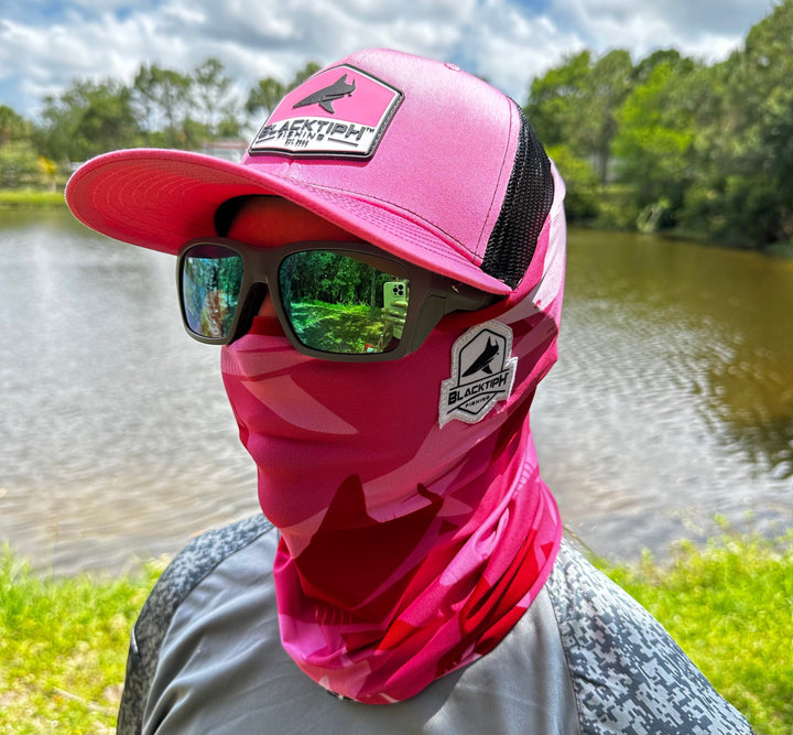 Pink BlacktipH performance face shield, lightweight and breathable apparel accessory, shown with adjustable straps and vibrant pink color.
