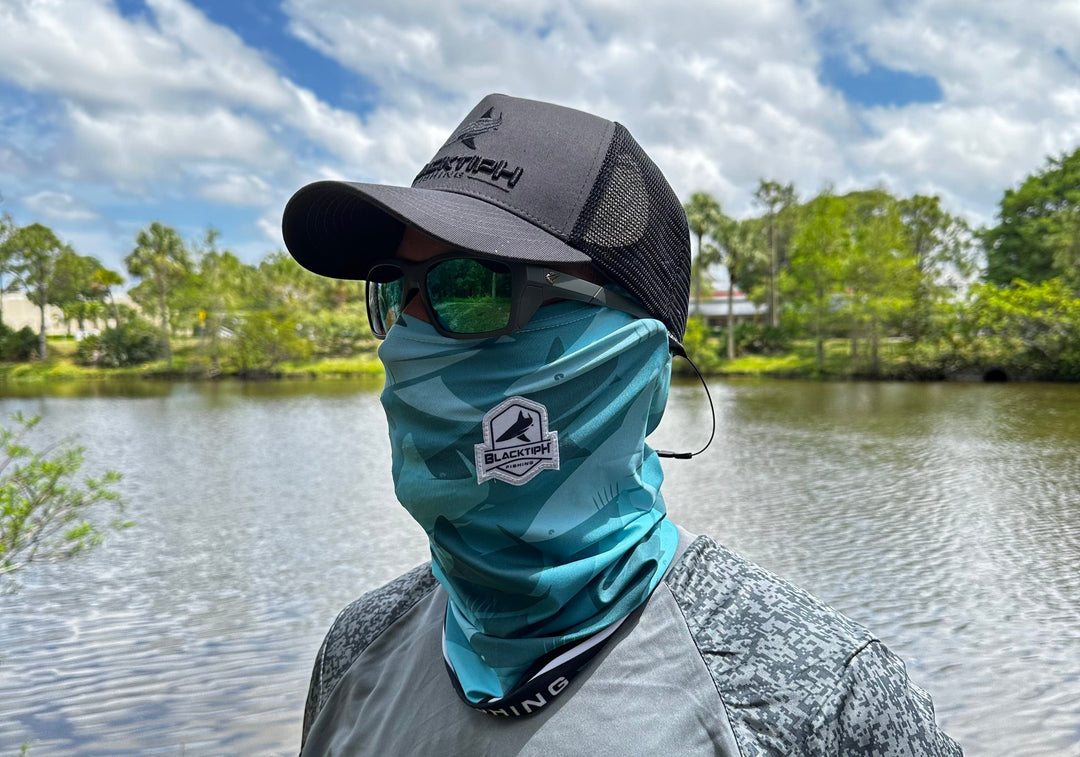 BlacktipH teal performance face shield, lightweight and breathable apparel accessory with adjustable straps for outdoor activities.