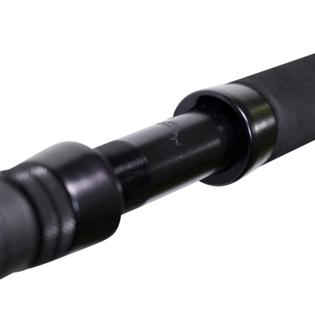 BlacktipH 30-50lb standup fishing rod with carbon fiber wrap, designed for heavy-duty saltwater fishing, featuring a durable build.