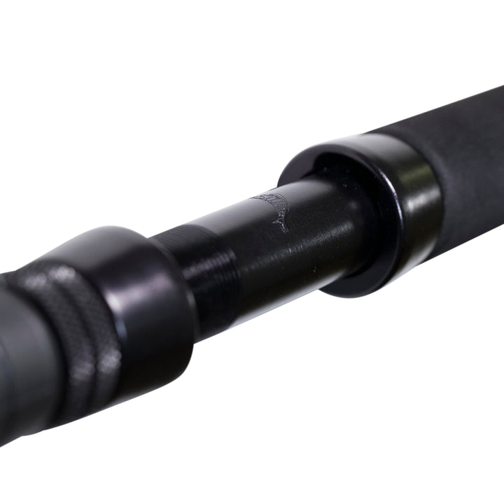 BlacktipH 30-50lb standup fishing rod with carbon fiber wrap, designed for heavy-duty saltwater fishing, featuring a durable build.