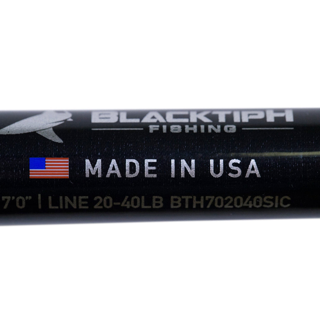 BlacktipH live bait fishing rod with Winthrop Epic butt and carbon fiber wrap, showing the rod's handle and sleek design.