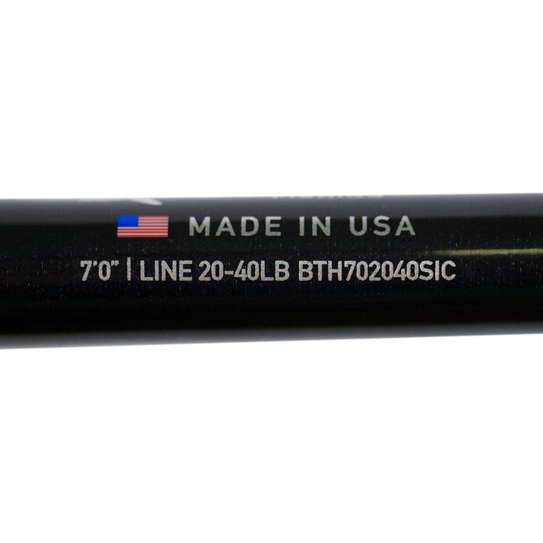 BlacktipH live bait fishing rod with Winthrop Epic butt and carbon fiber wrap, shown held in hand for freshwater or saltwater fishing.