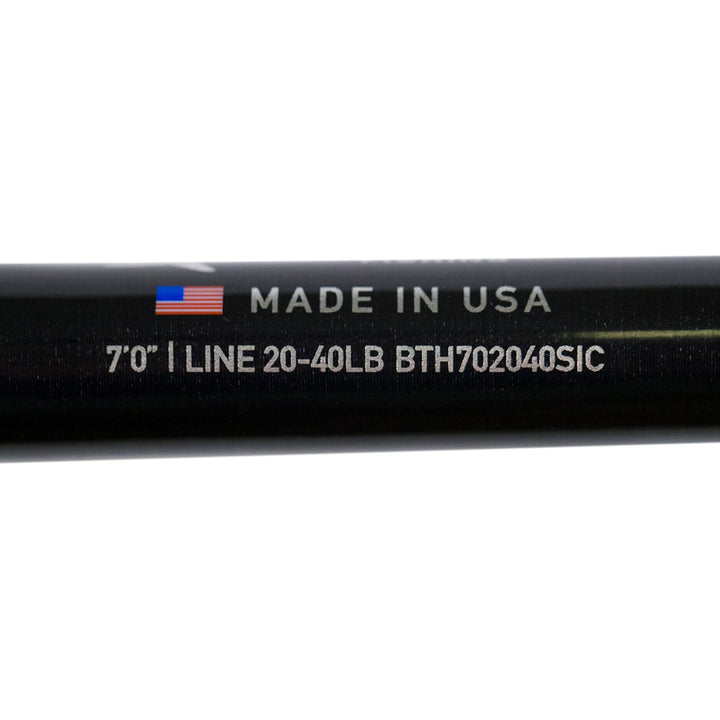BlacktipH live bait fishing rod with Winthrop Epic butt and carbon fiber wrap, shown held in hand for freshwater or saltwater fishing.