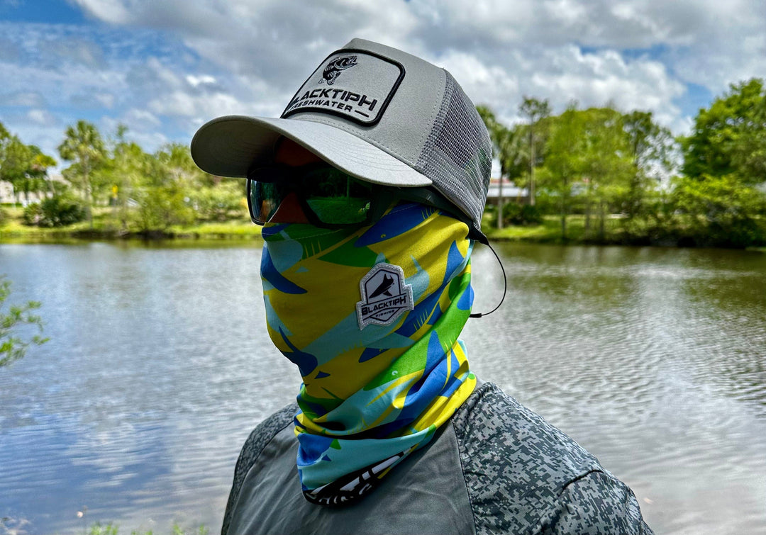 BlacktipH yellow and green performance face shield neck scarf, lightweight and breathable for outdoor activities.